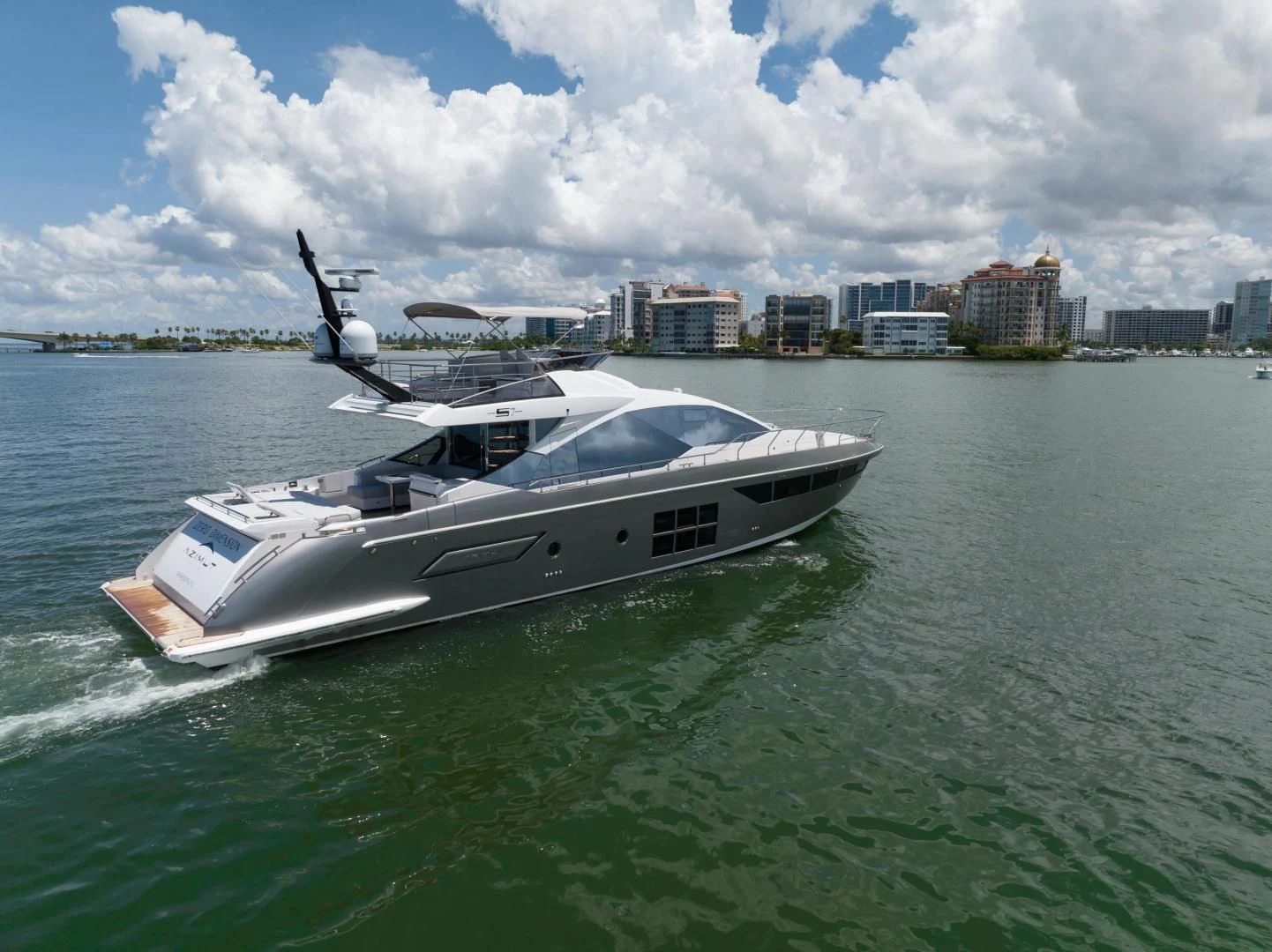 a helicopter flying over a boat in the water aboard ZERO DIMENSION Yacht for Sale
