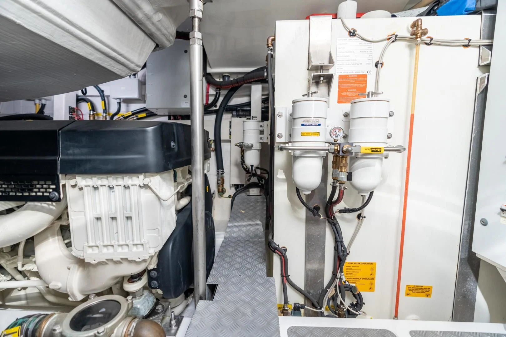 a white machine in a room aboard ZERO DIMENSION Yacht for Sale