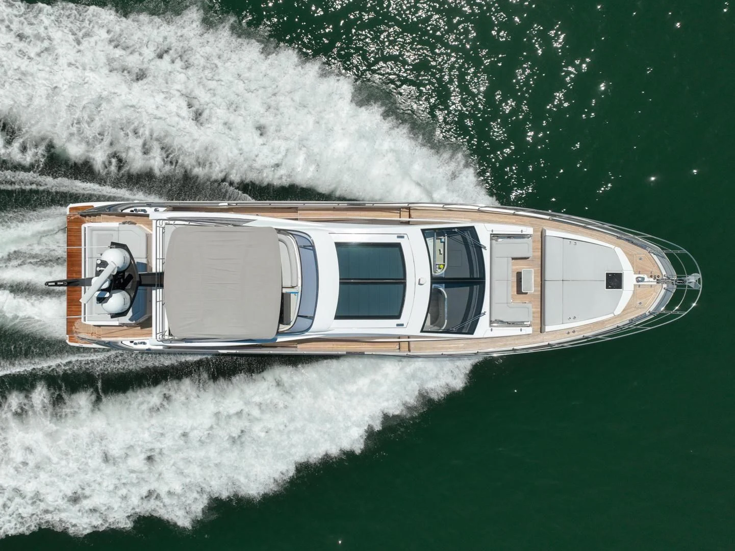 a helicopter flying over a body of water aboard ZERO DIMENSION Yacht for Sale