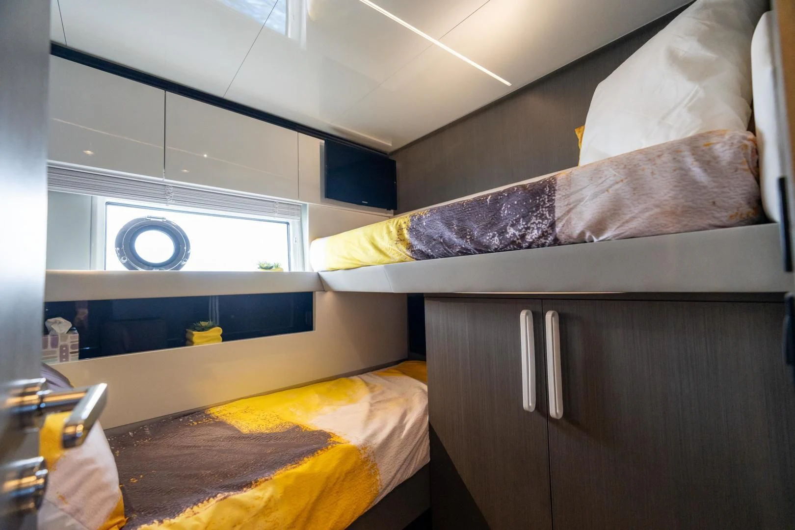 a person lying on a bed aboard ZERO DIMENSION Yacht for Sale