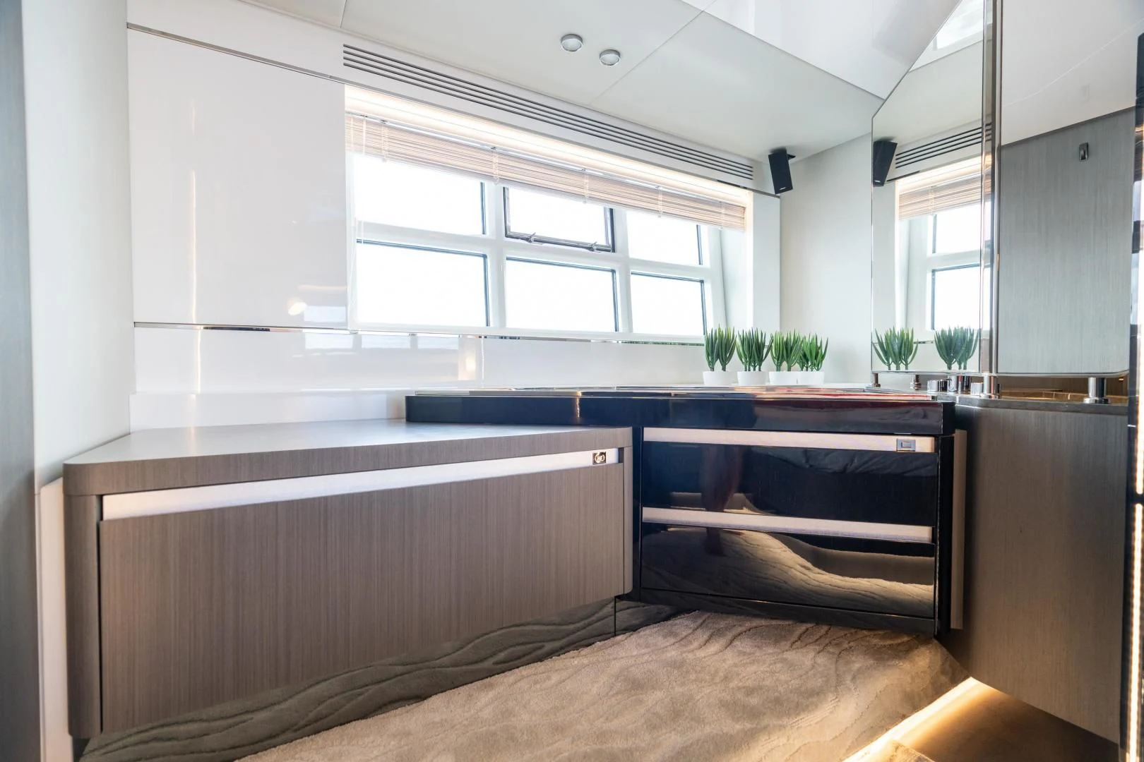 a room with a bed and a window aboard ZERO DIMENSION Yacht for Sale