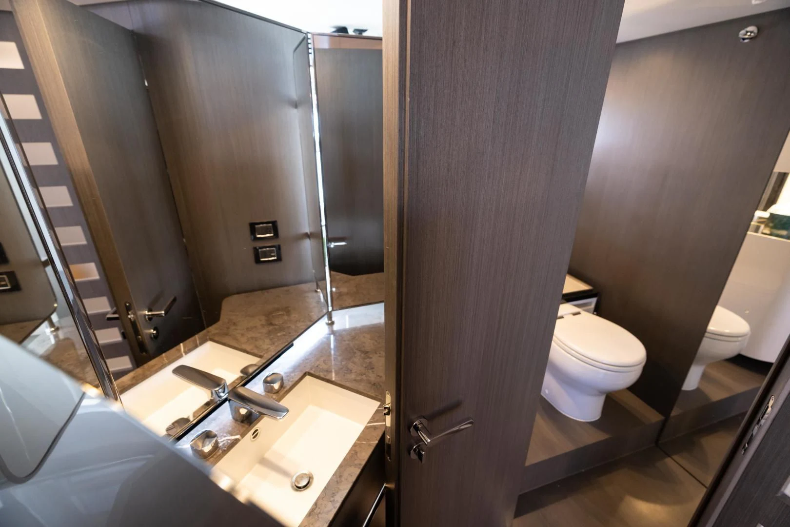 a bathroom with a large mirror aboard ZERO DIMENSION Yacht for Sale