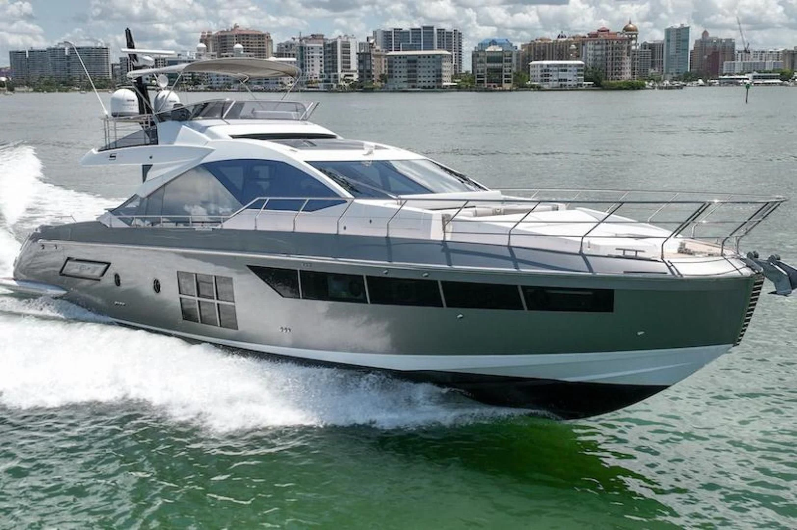 a white yacht on the water aboard ZERO DIMENSION Yacht for Sale