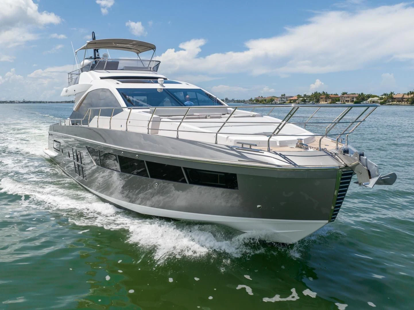 a white yacht on the water aboard ZERO DIMENSION Yacht for Sale