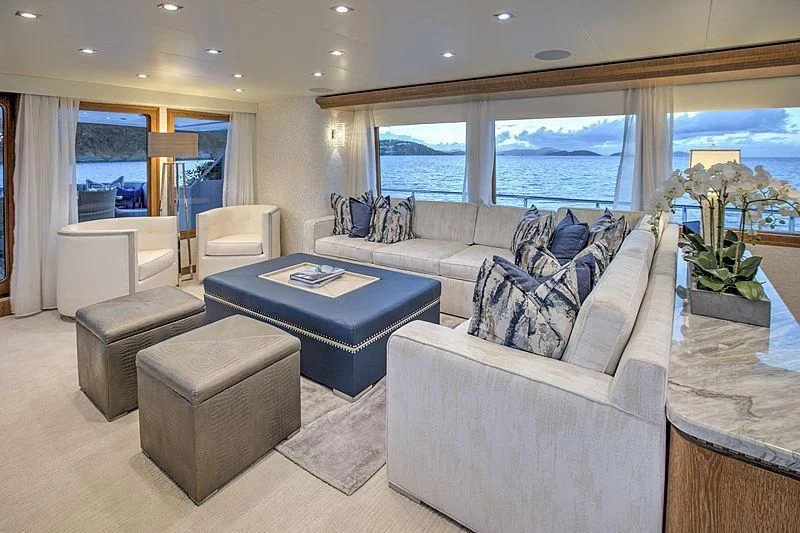 a living room with a large window aboard WINNING HAND Yacht for Sale