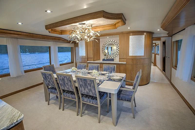 a dining room with a large table aboard WINNING HAND Yacht for Sale