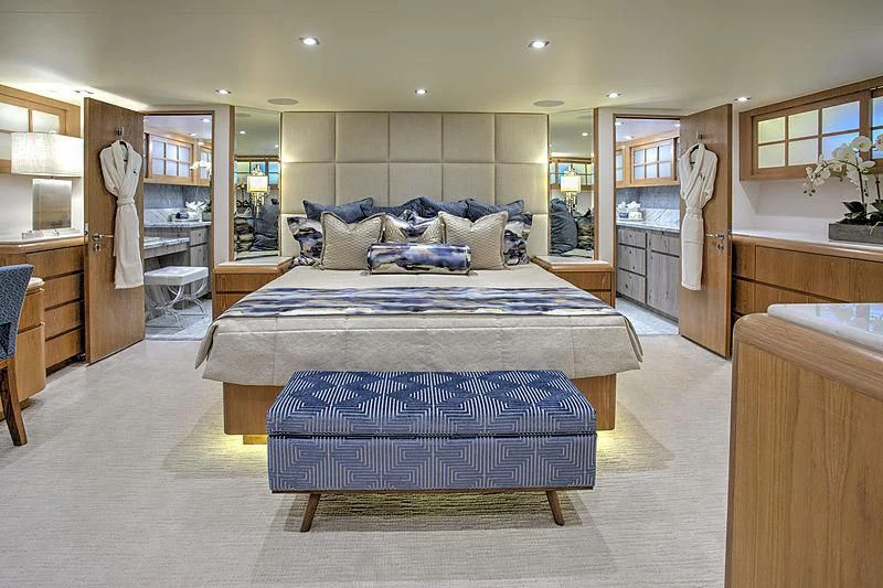 a large bedroom with a large bed aboard WINNING HAND Yacht for Sale