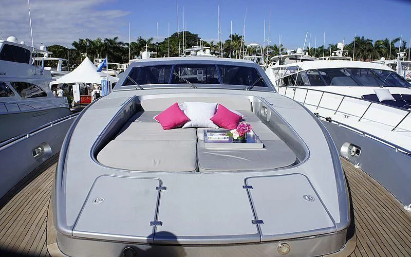 a white boat with pink ribbon on the front aboard JUST FOR FUN 88 Yacht for Sale
