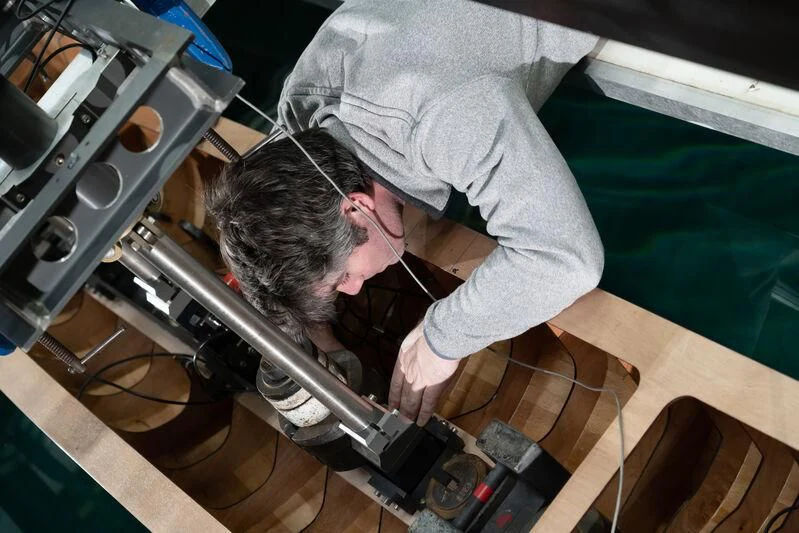 a man working on a machine aboard PROJECT SETTEESETTANTA Yacht for Sale