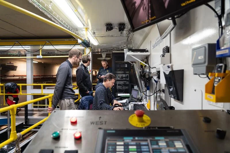 a group of people in a factory aboard PROJECT SETTEESETTANTA Yacht for Sale