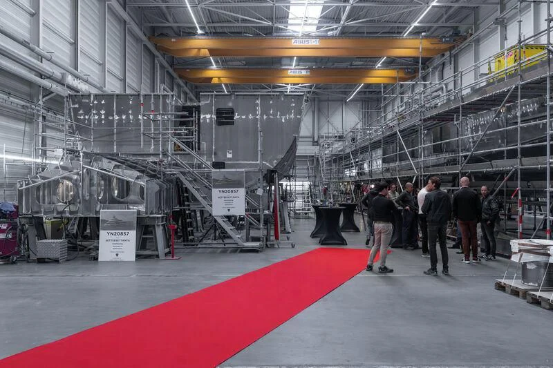 a group of people in a warehouse aboard PROJECT SETTEESETTANTA Yacht for Sale