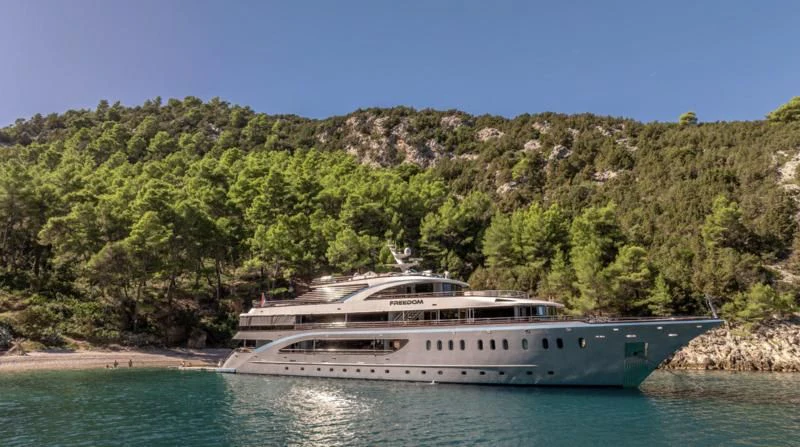 a boat on the water aboard FREEDOM Yacht for Sale