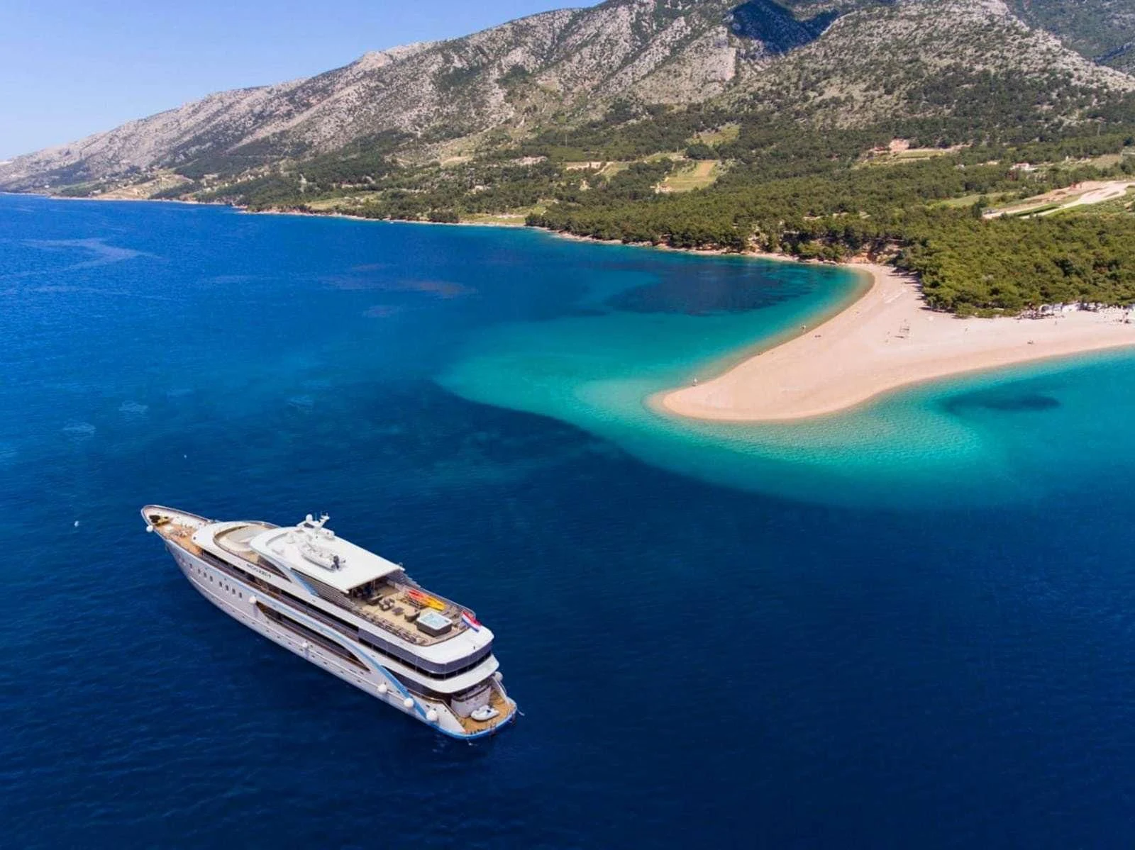 a boat floating in water aboard FREEDOM Yacht for Sale