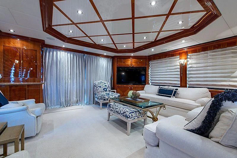 a living room with a large window aboard CIN-TAX Yacht for Sale