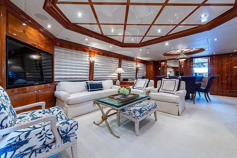 a living room with a large wood ceiling aboard CIN-TAX Yacht for Sale