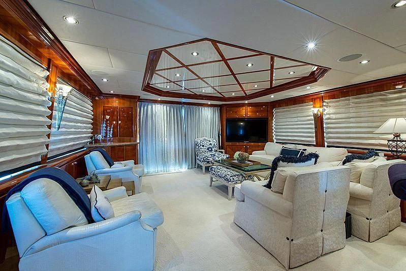 a large living room with a large open window aboard CIN-TAX Yacht for Sale