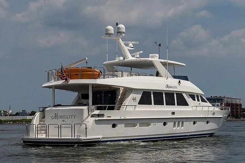 a white boat on the water aboard CIN-TAX Yacht for Sale