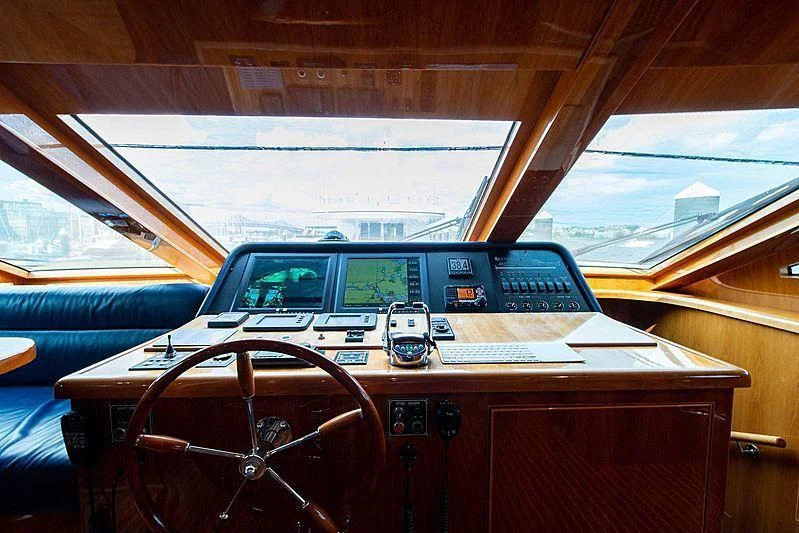 a car with a radio in the driver's seat aboard CIN-TAX Yacht for Sale