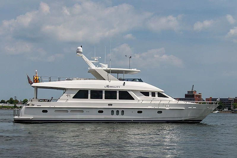 a white yacht on the water aboard CIN-TAX Yacht for Sale