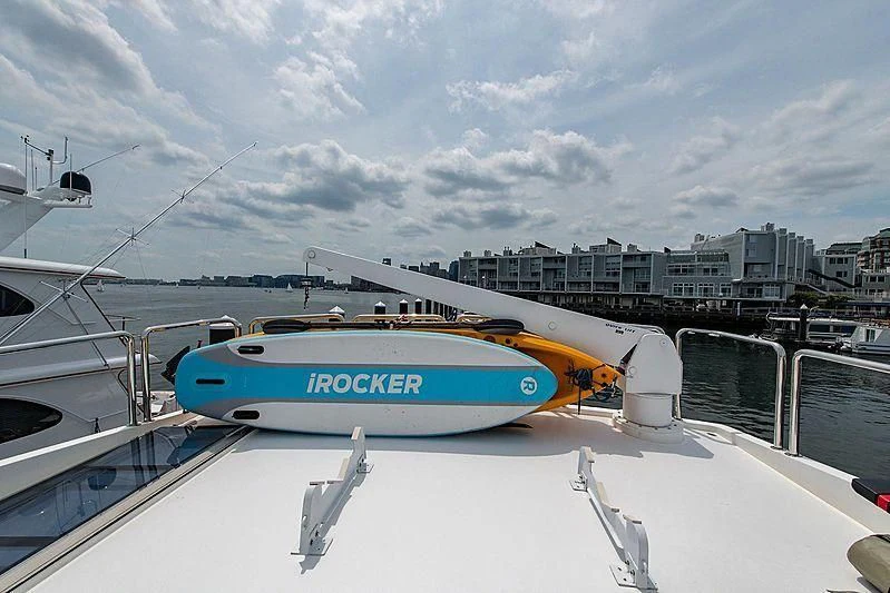 a boat on a deck aboard CIN-TAX Yacht for Sale