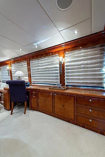 a room with a desk and a chair aboard CIN-TAX Yacht for Sale