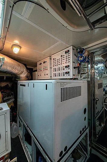 a large refrigerator in a kitchen aboard CIN-TAX Yacht for Sale