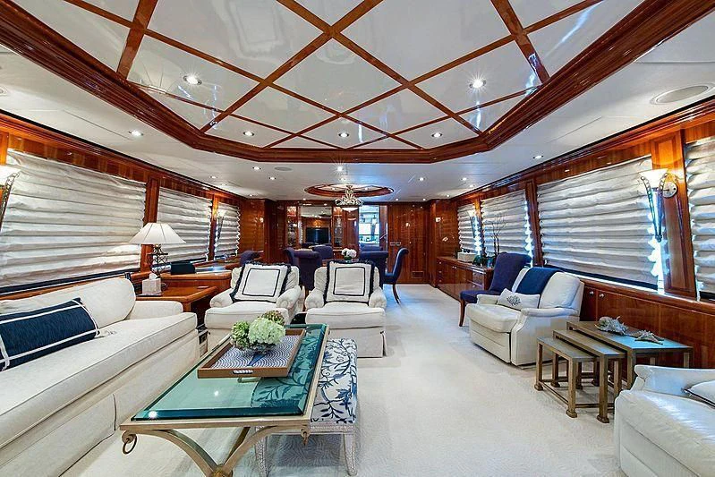 a large living room with a large open ceiling aboard CIN-TAX Yacht for Sale