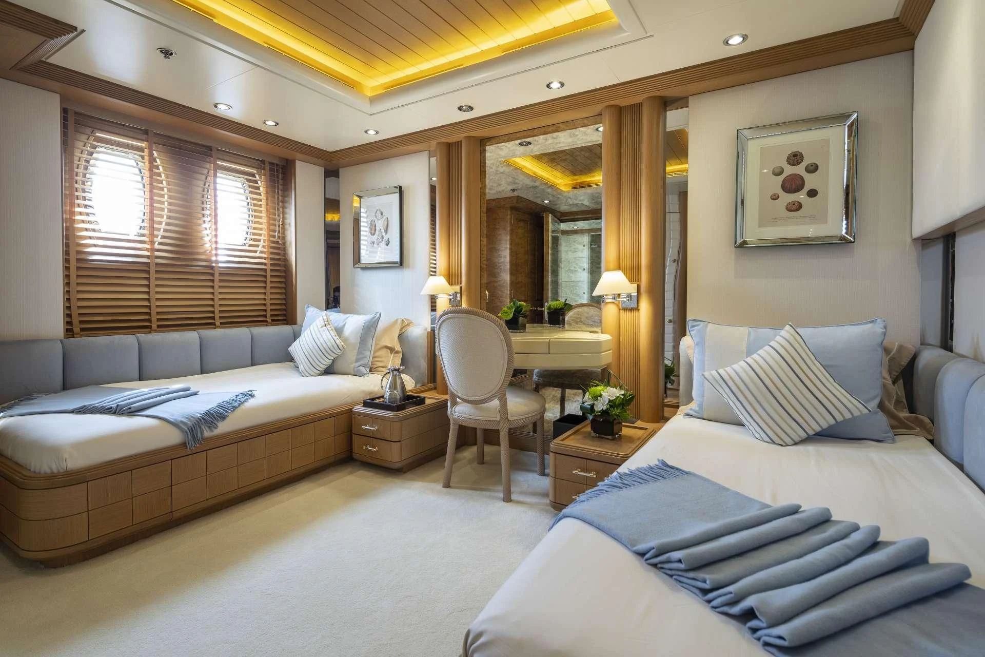 a bedroom with a bed and a couch aboard MARLA Yacht for Sale