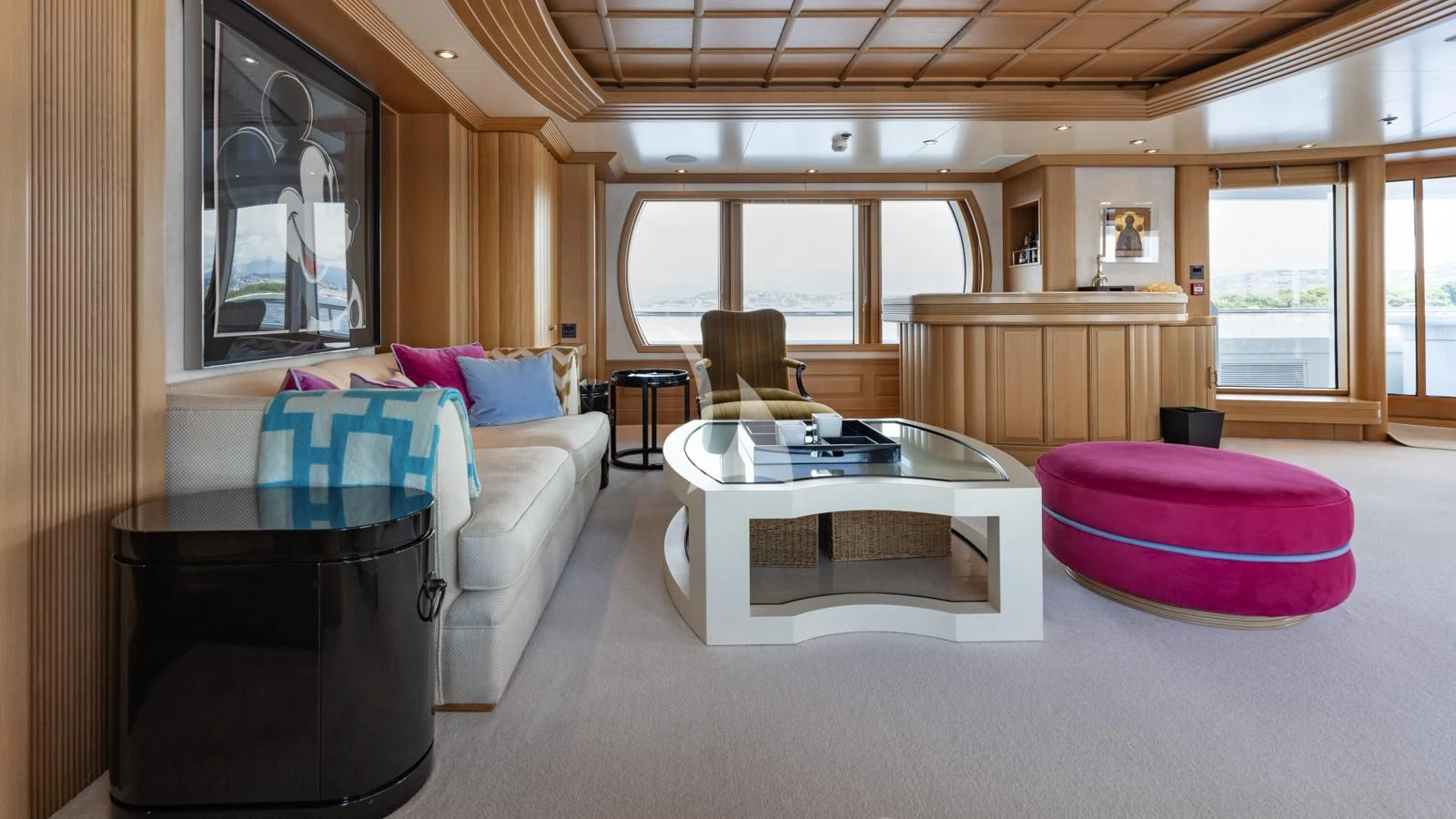 a living room with a table and chairs aboard MARLA Yacht for Sale