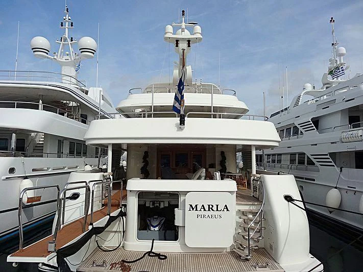 a boat with a sign on the front aboard MARLA Yacht for Sale