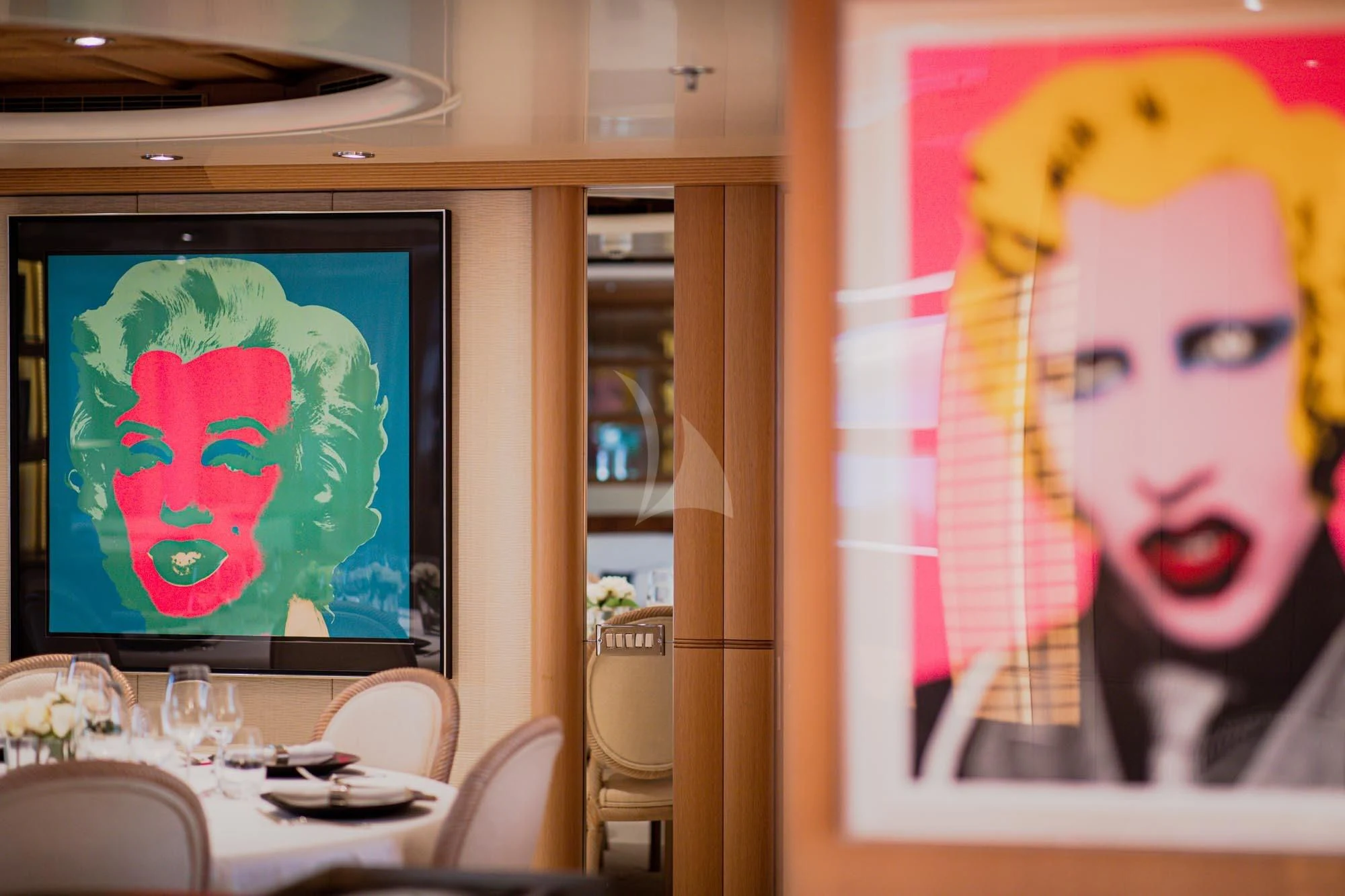 a table with a painting on it aboard MARLA Yacht for Sale