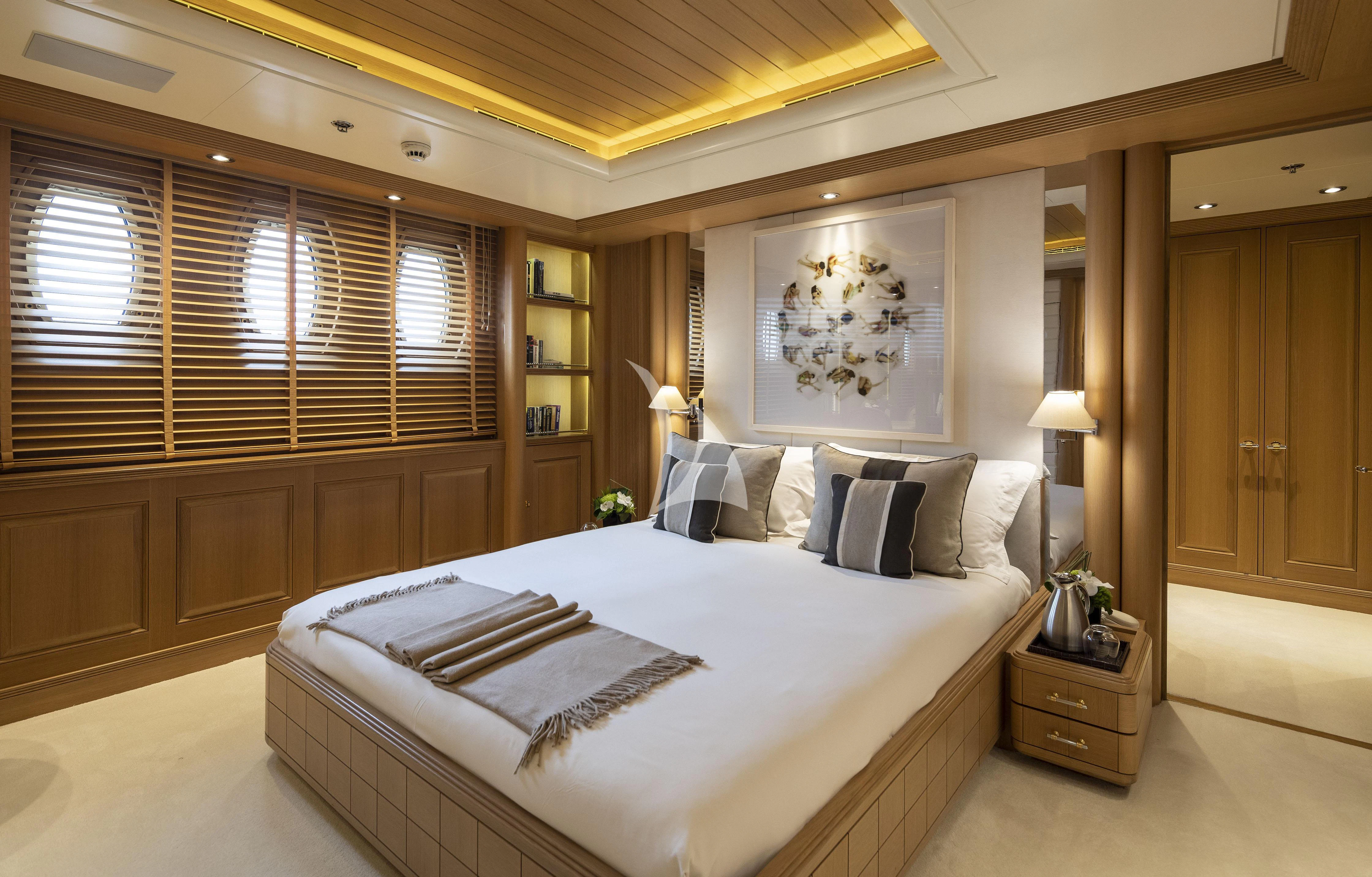 a large bedroom with a large bed aboard MARLA Yacht for Sale