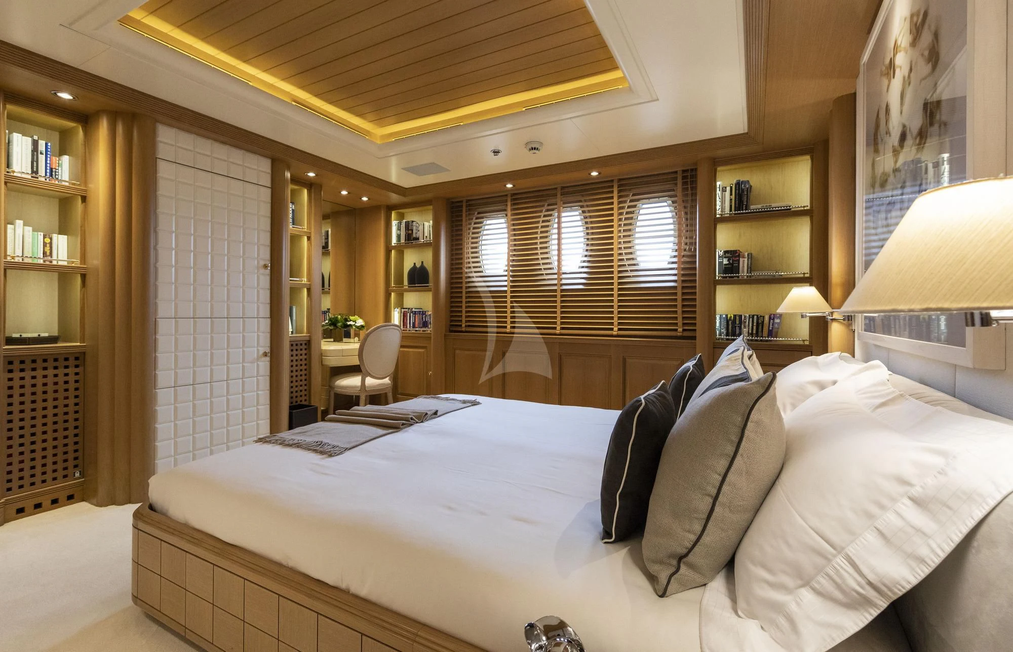 a bed with white sheets and pillows aboard MARLA Yacht for Sale