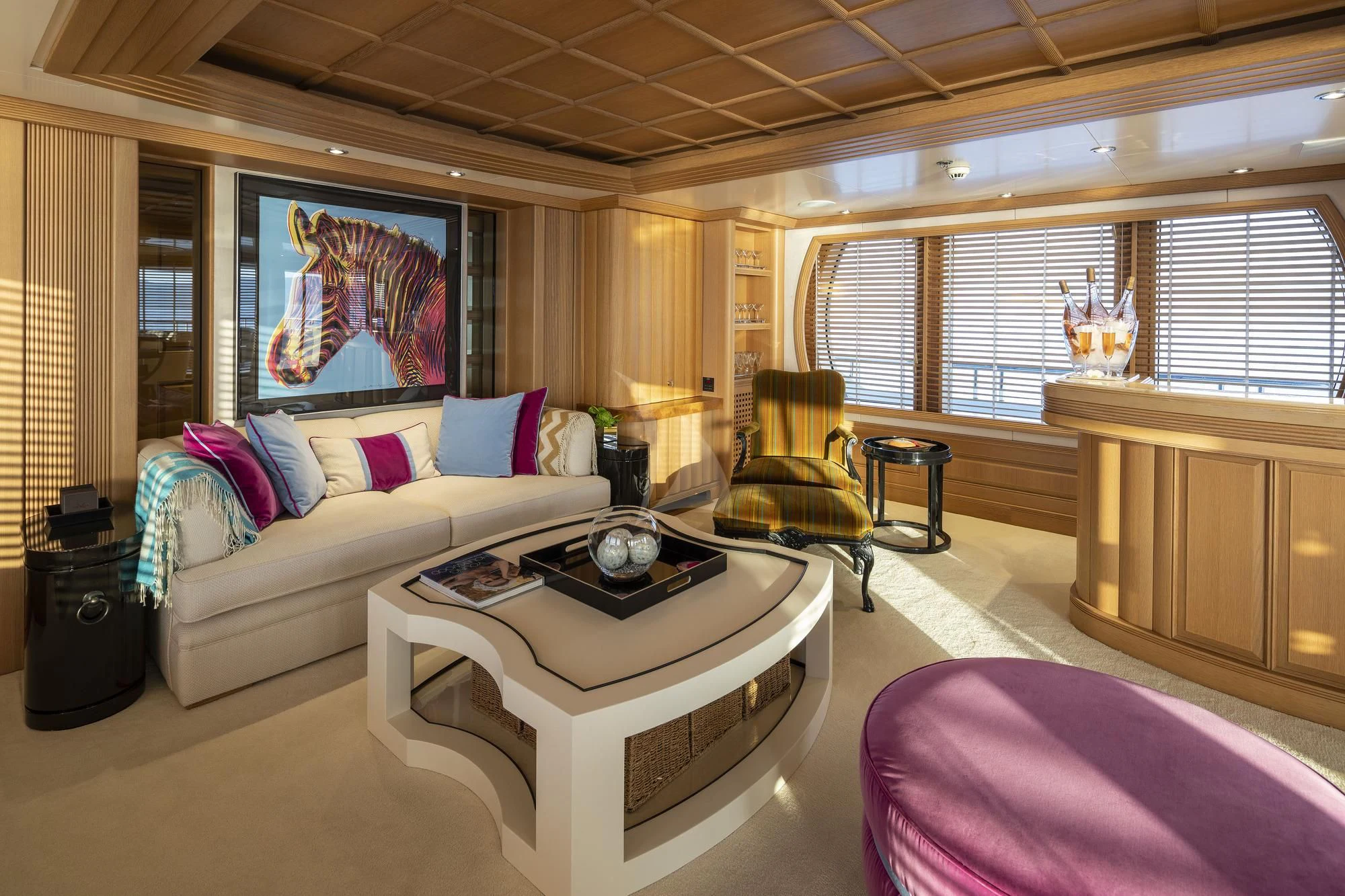 a living room with a couch and a coffee table aboard MARLA Yacht for Sale