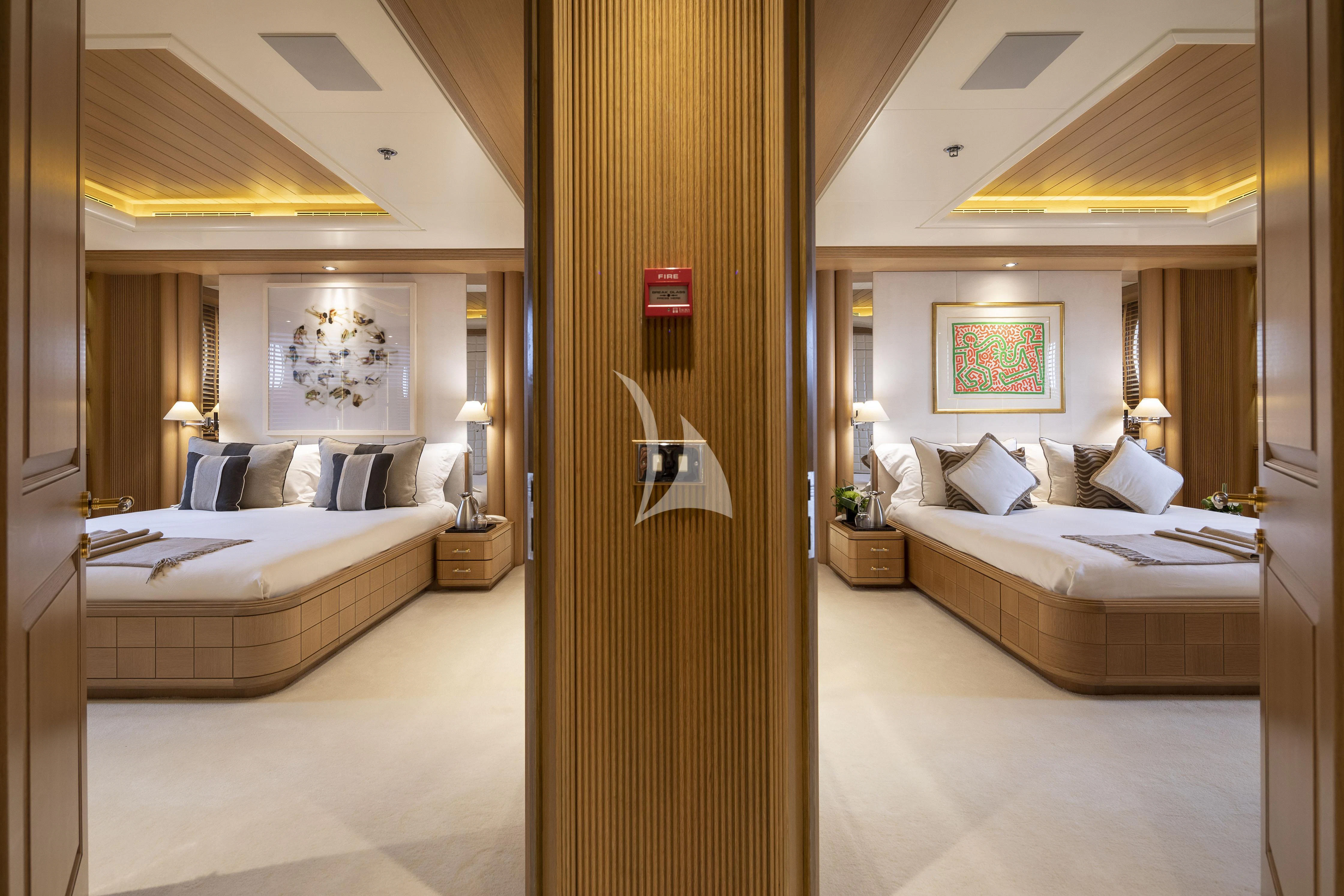 a room with a bed and a door aboard MARLA Yacht for Sale