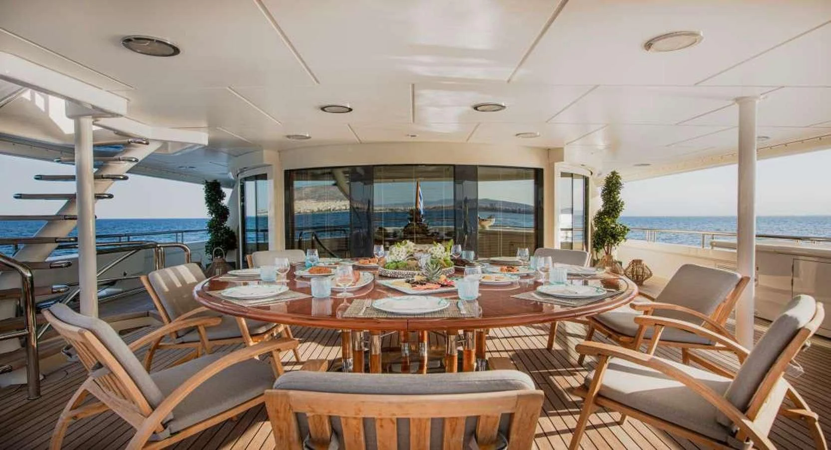 a table set for a meal on a boat aboard MARLA Yacht for Sale