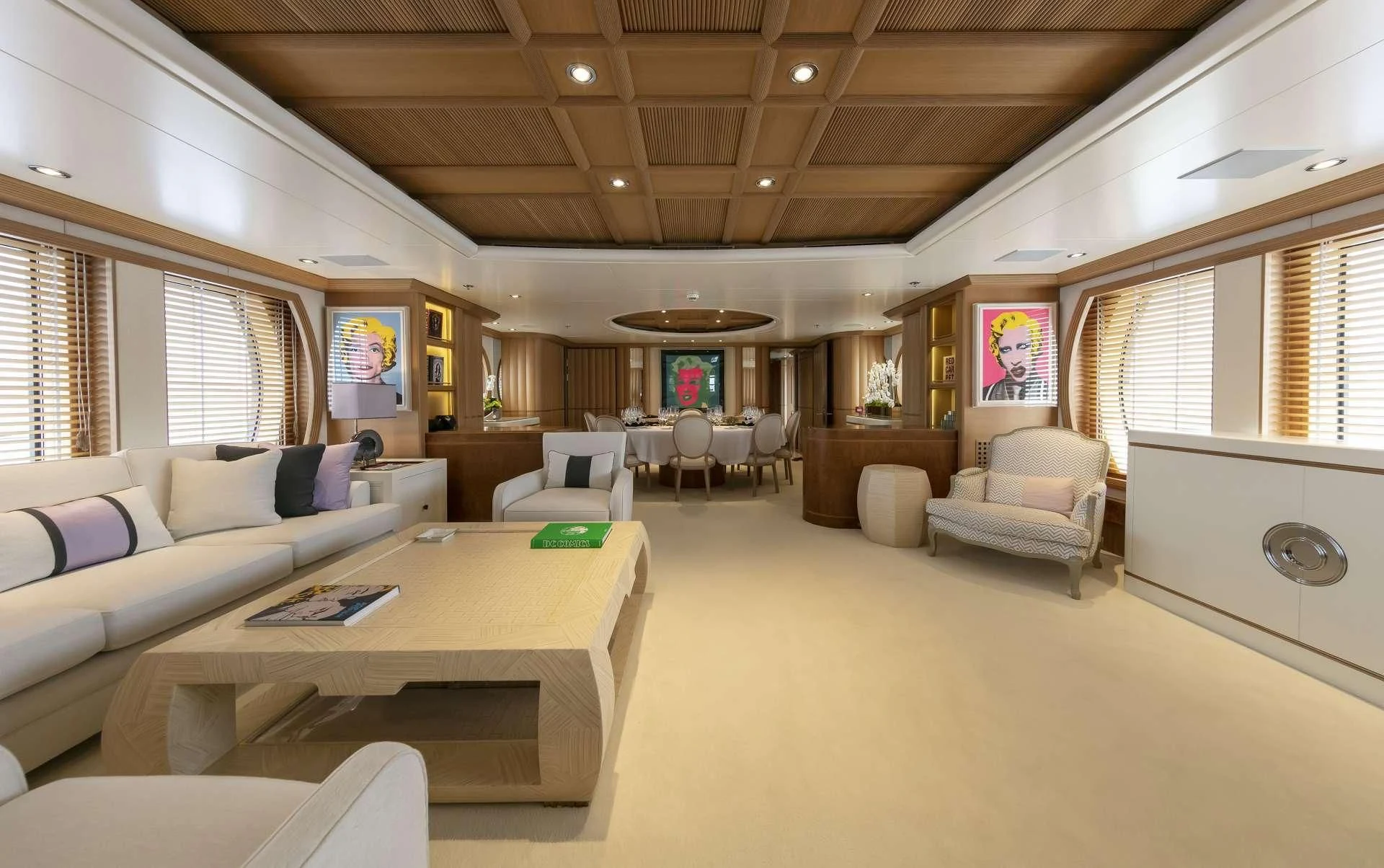 a living room with a couch and a table aboard MARLA Yacht for Sale