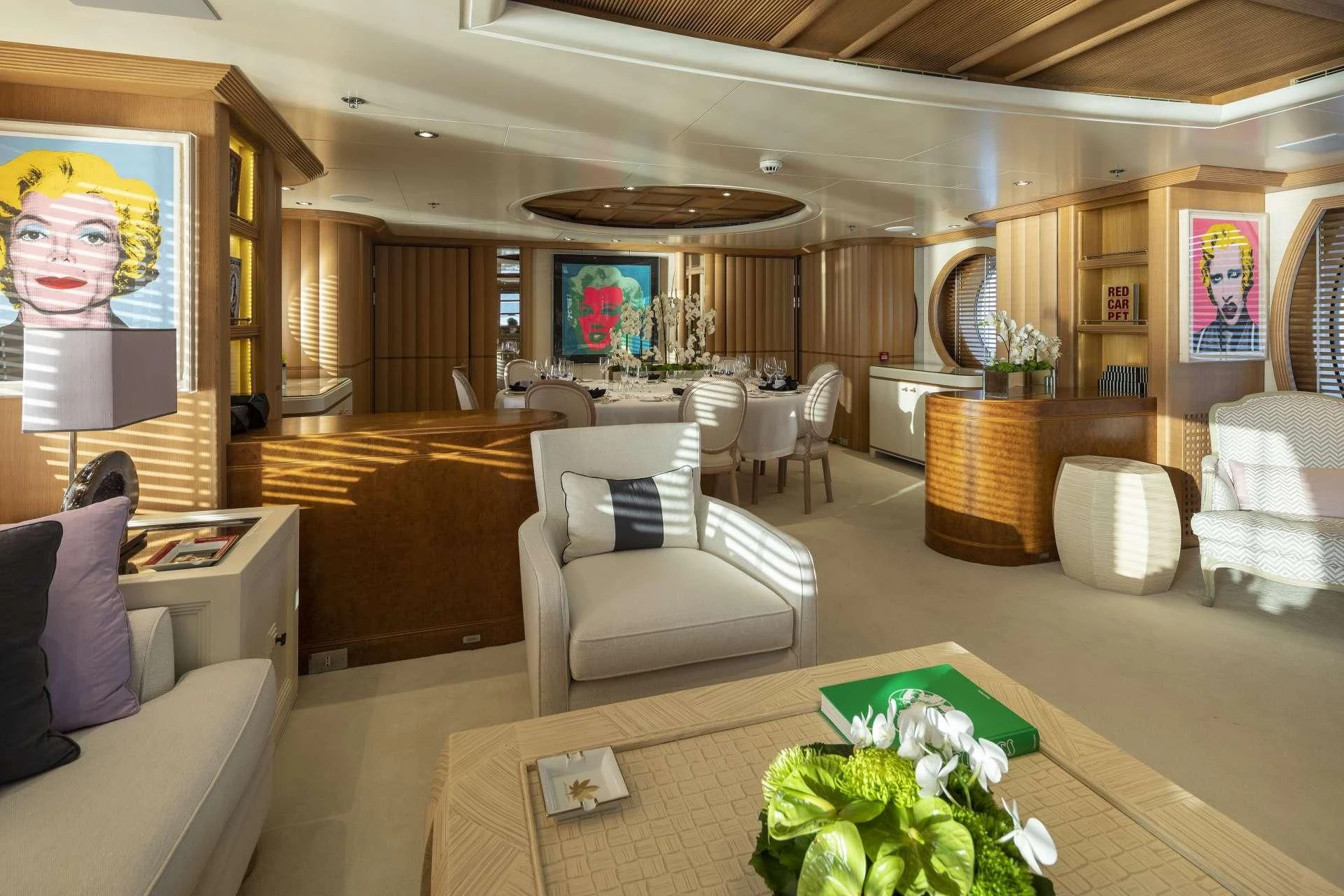 a living room with a large screen aboard MARLA Yacht for Sale