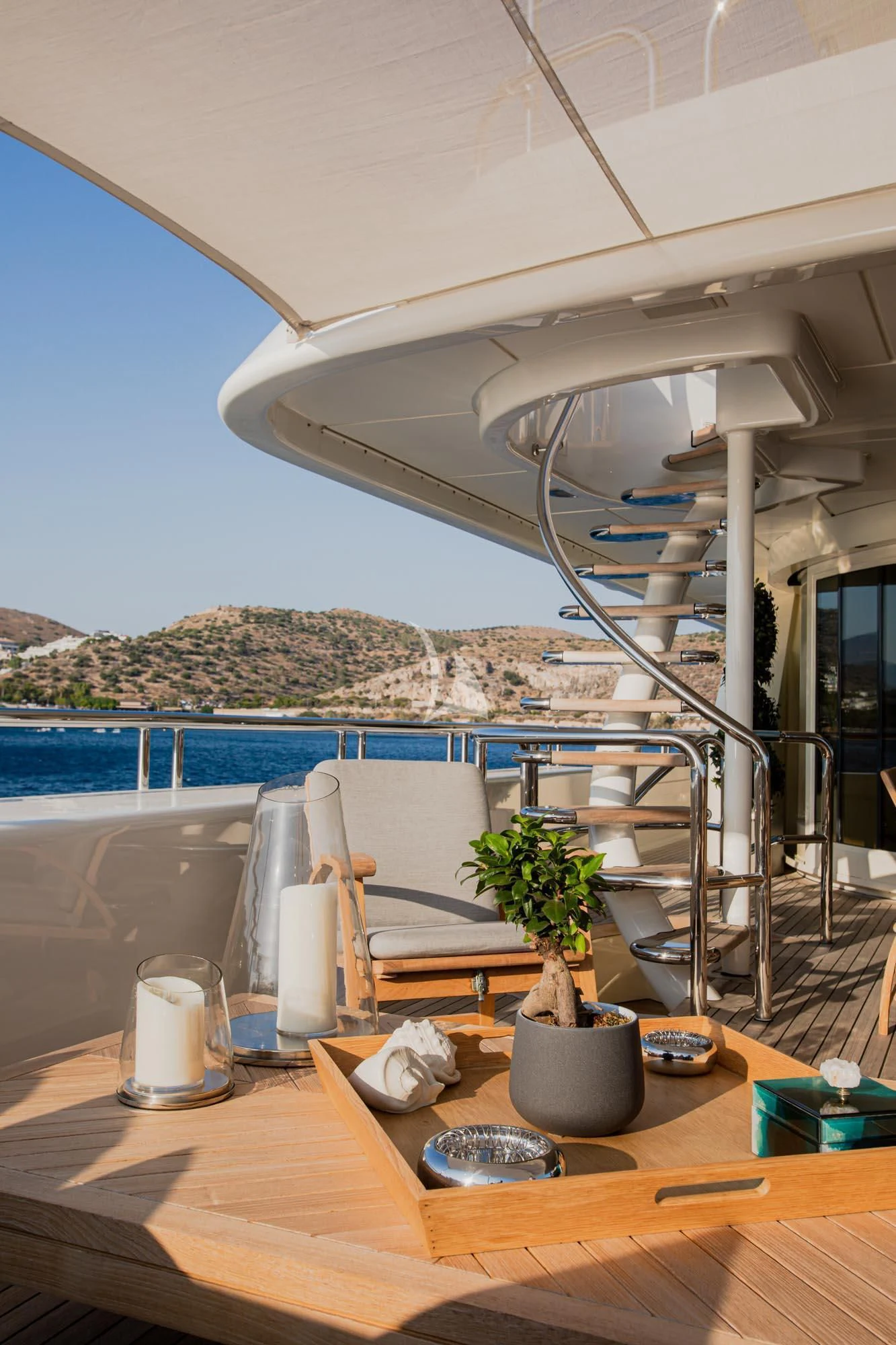 a table with a plant on it aboard MARLA Yacht for Sale