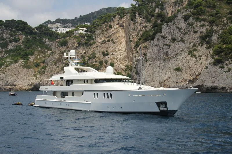 a white boat on water aboard MARLA Yacht for Sale