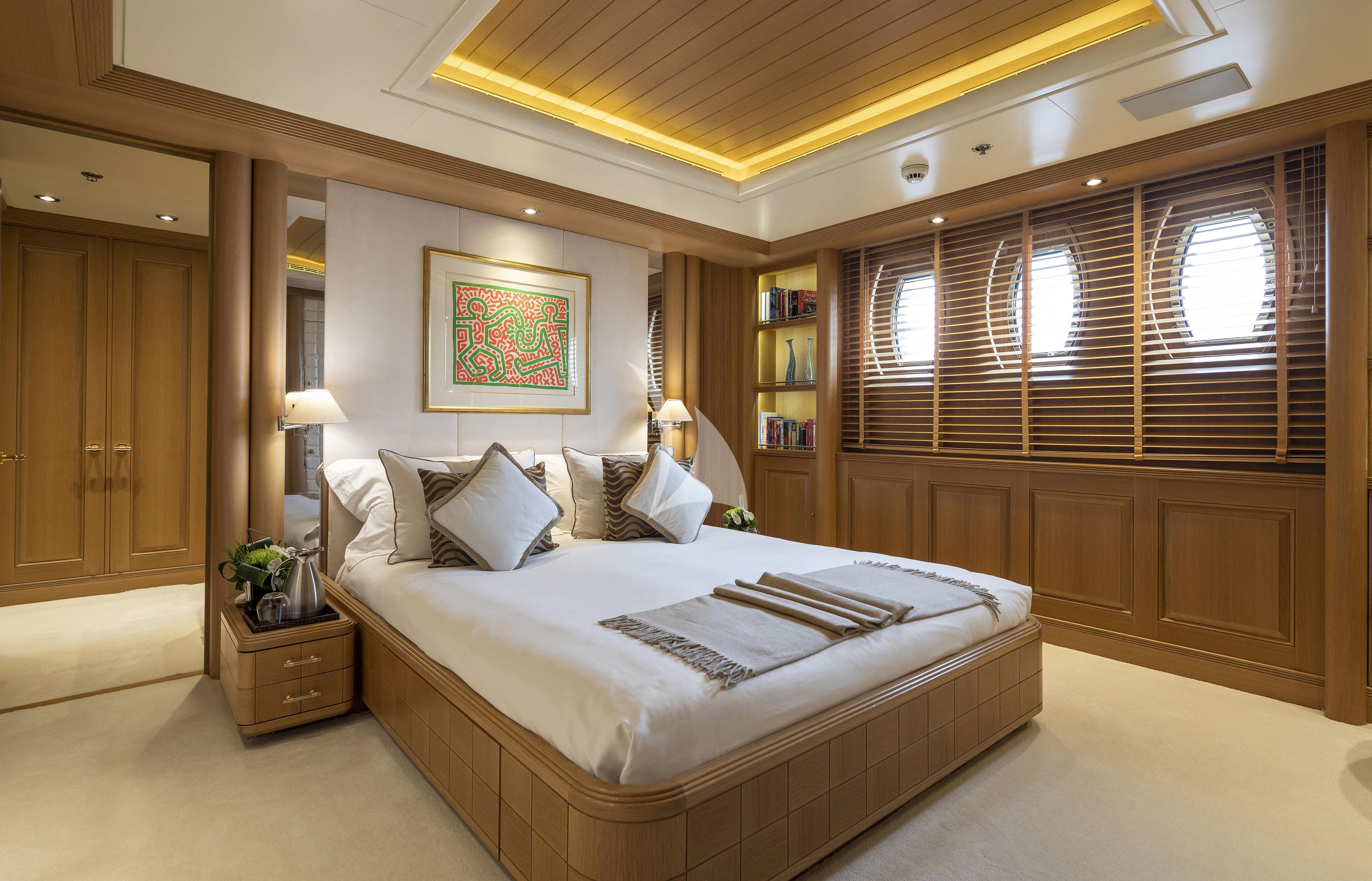 a room with a bed and a window aboard MARLA Yacht for Sale