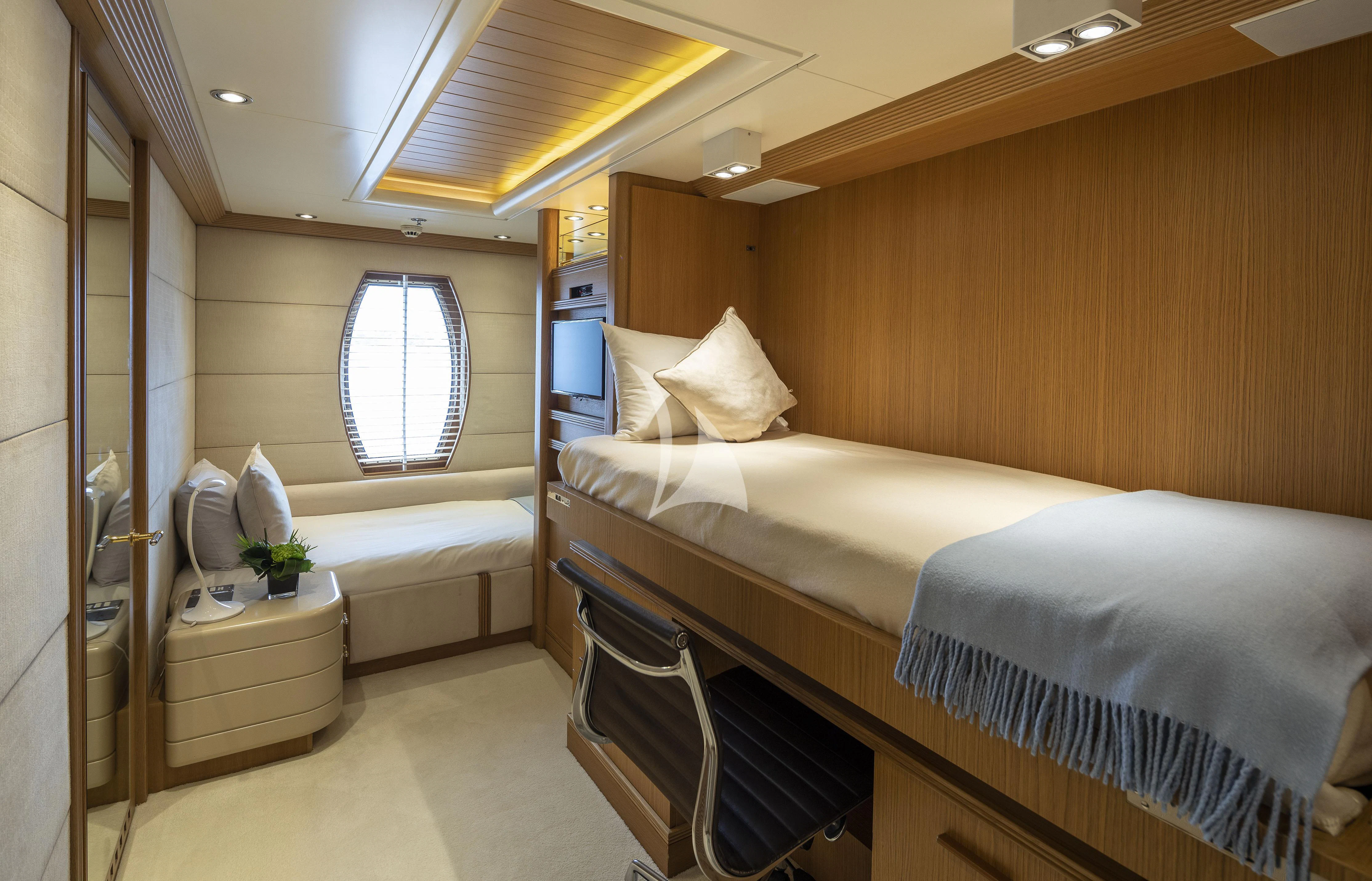 a room with a bed and a window aboard MARLA Yacht for Sale