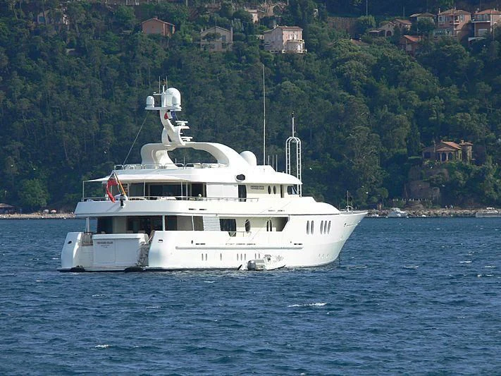 a white boat on the water aboard MARLA Yacht for Sale