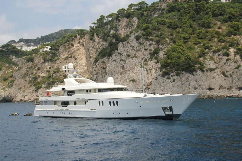 a white boat on water aboard MARLA Yacht for Sale