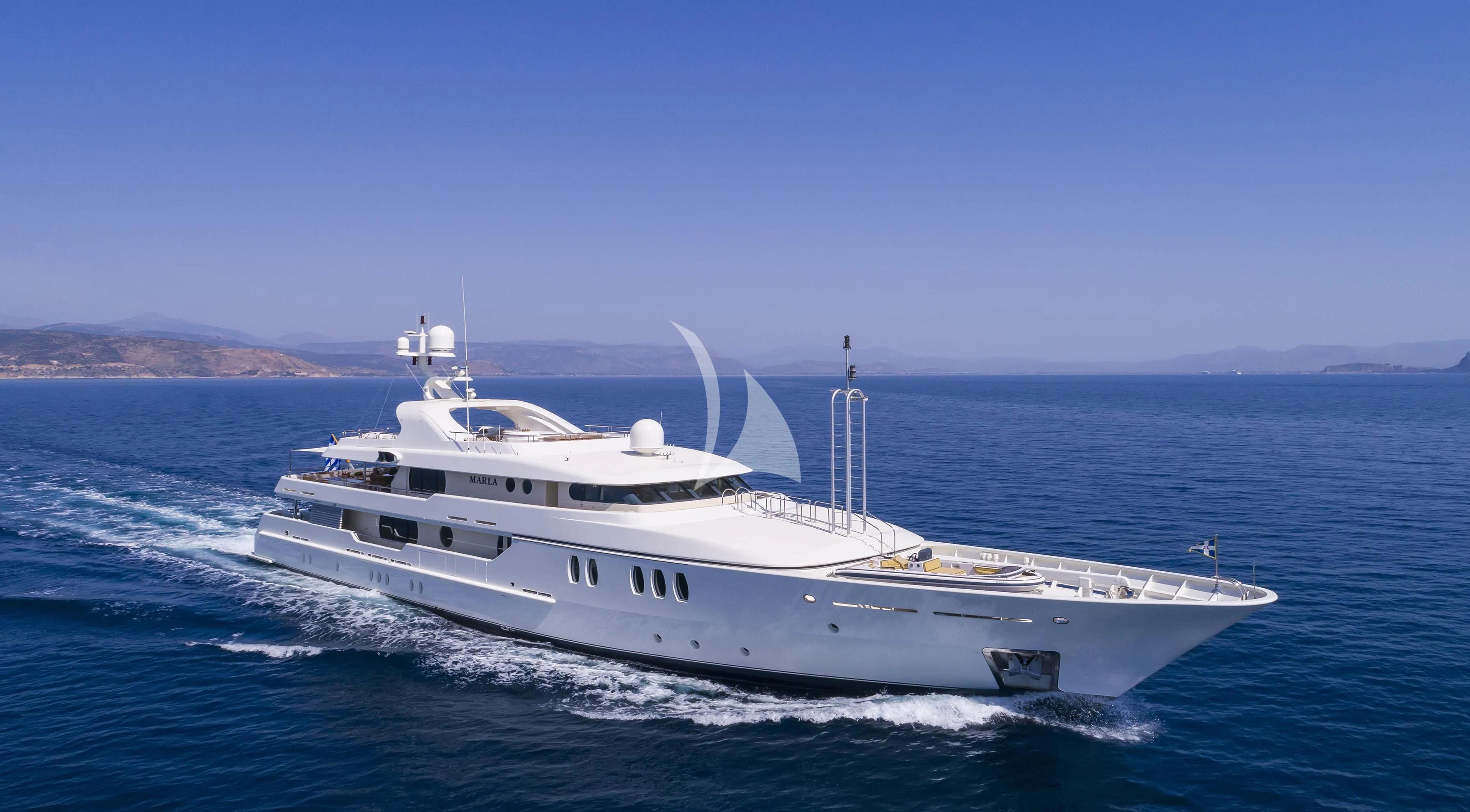a white yacht on the water aboard MARLA Yacht for Sale