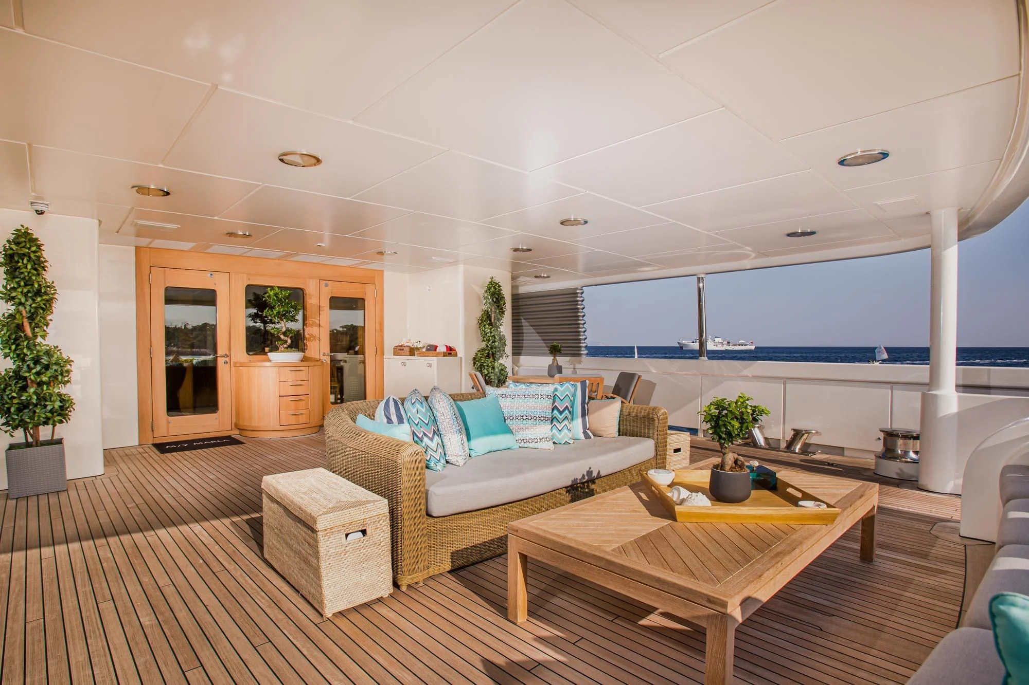 a living room with a large open window aboard MARLA Yacht for Sale
