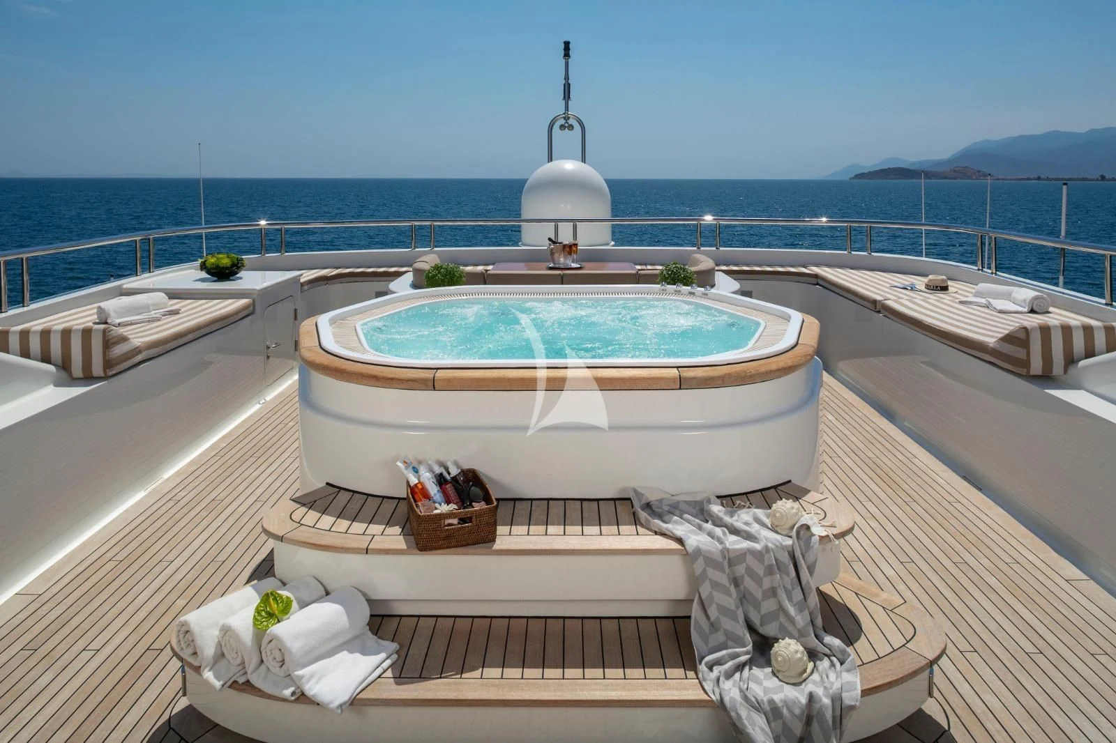 a bathtub with a sink on it by the ocean aboard MARLA Yacht for Sale