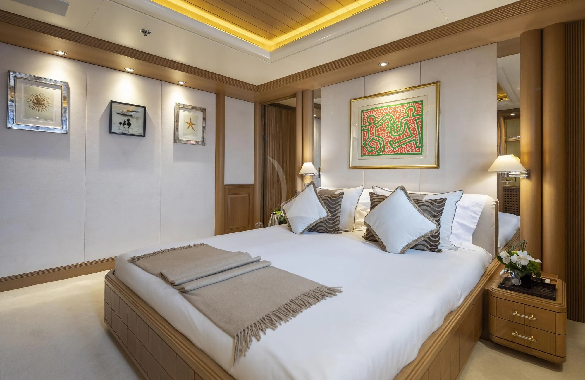 a large bed in a hotel room aboard MARLA Yacht for Sale