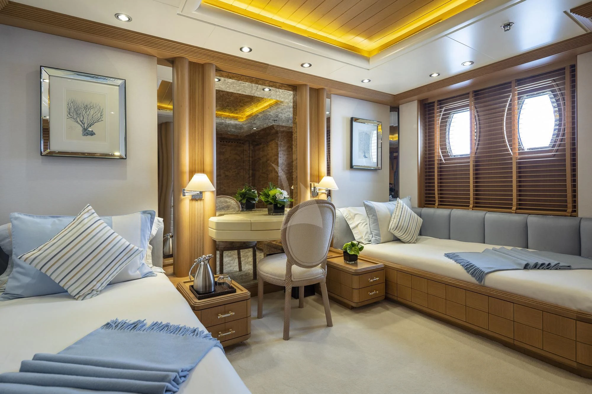 a room with two beds and a desk aboard MARLA Yacht for Sale
