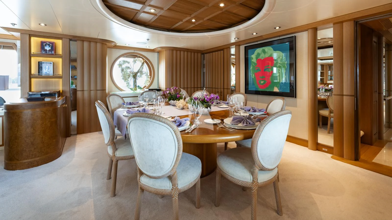 a large dining room with a large table and chairs aboard MARLA Yacht for Sale